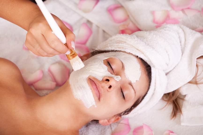 Young women getting facial mask beautymarkshop
